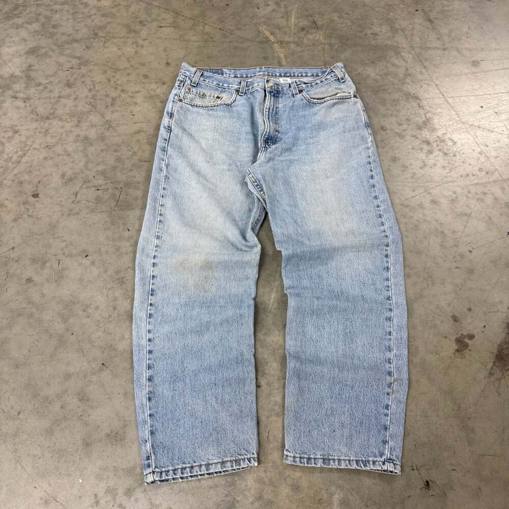 Vintage 1990s Levi's 550 Relaxed Fit Jeans Size 38x30 Light Wash Denim